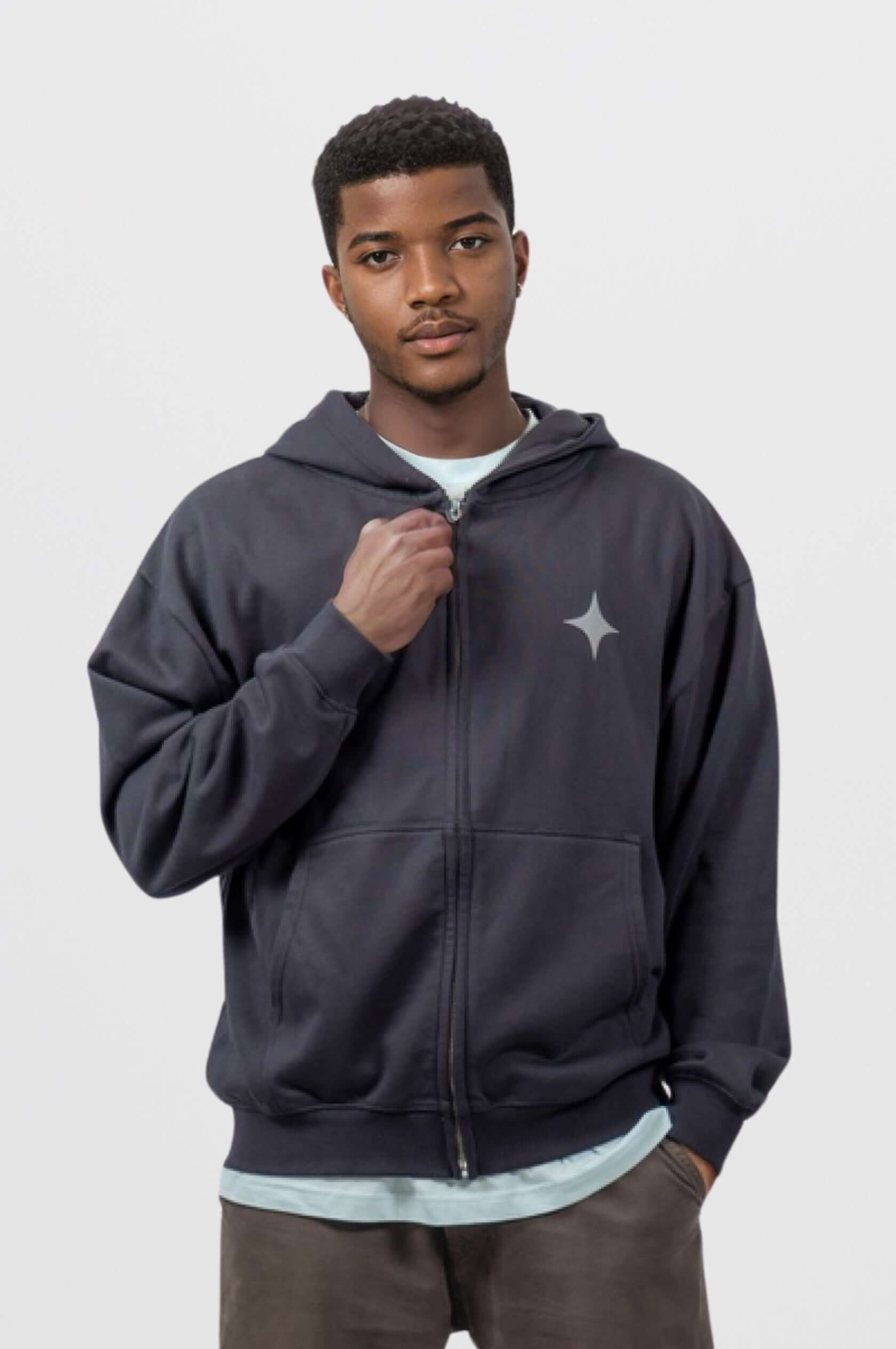 Model wearing the Sanity Midnight Zip-Up hoodie in black with grey puff print and signature embroidery.
