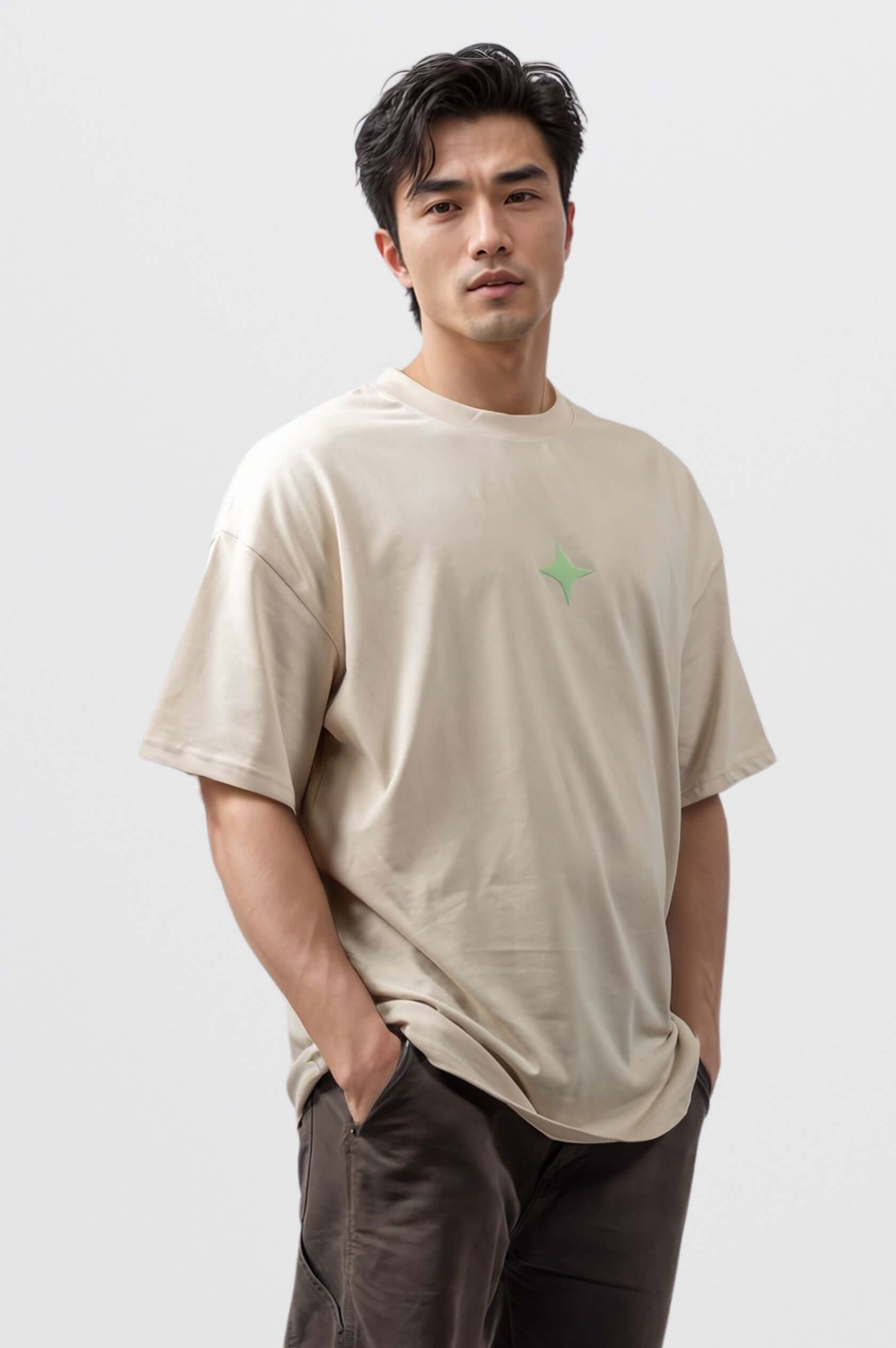 Model wearing an off-white Sanity Mint Tee with a mint print, showcasing a relaxed fit and signature embroidery.