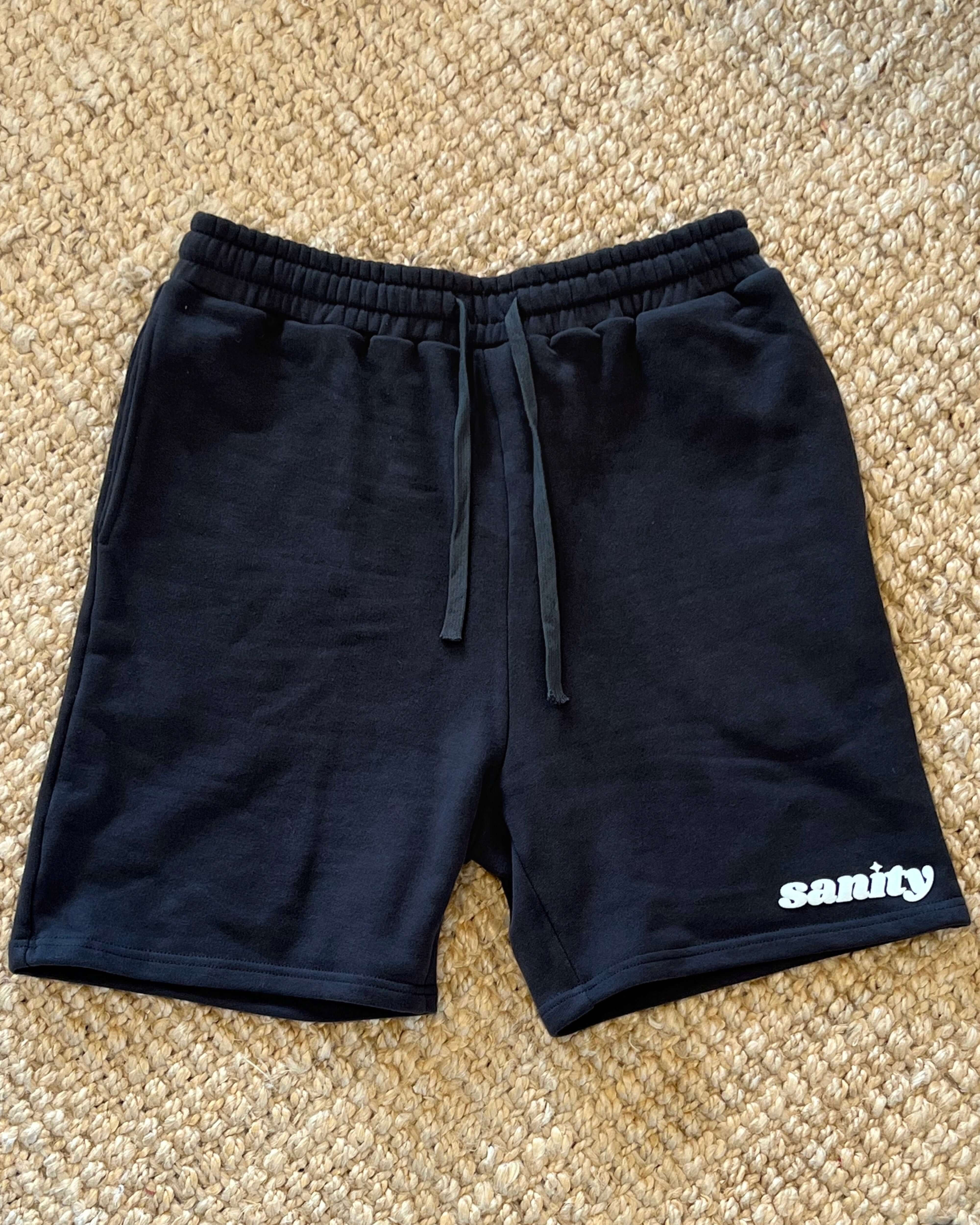 Sanity Shadow Men's Shorts in deep charcoal with draw cord, perfect for casual wear and comfort.