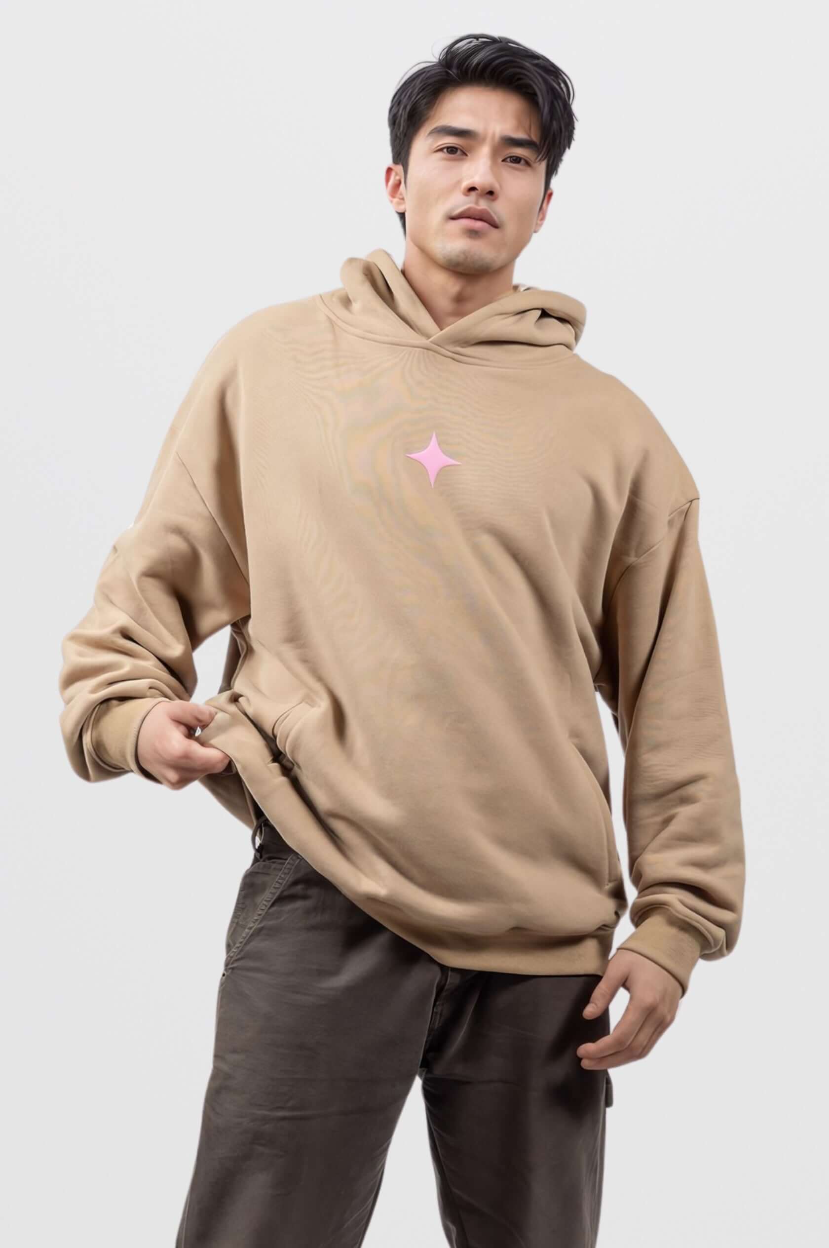 Unisex brown hoodie with vibrant pink print, crafted from heavyweight cotton for warmth and durability.
