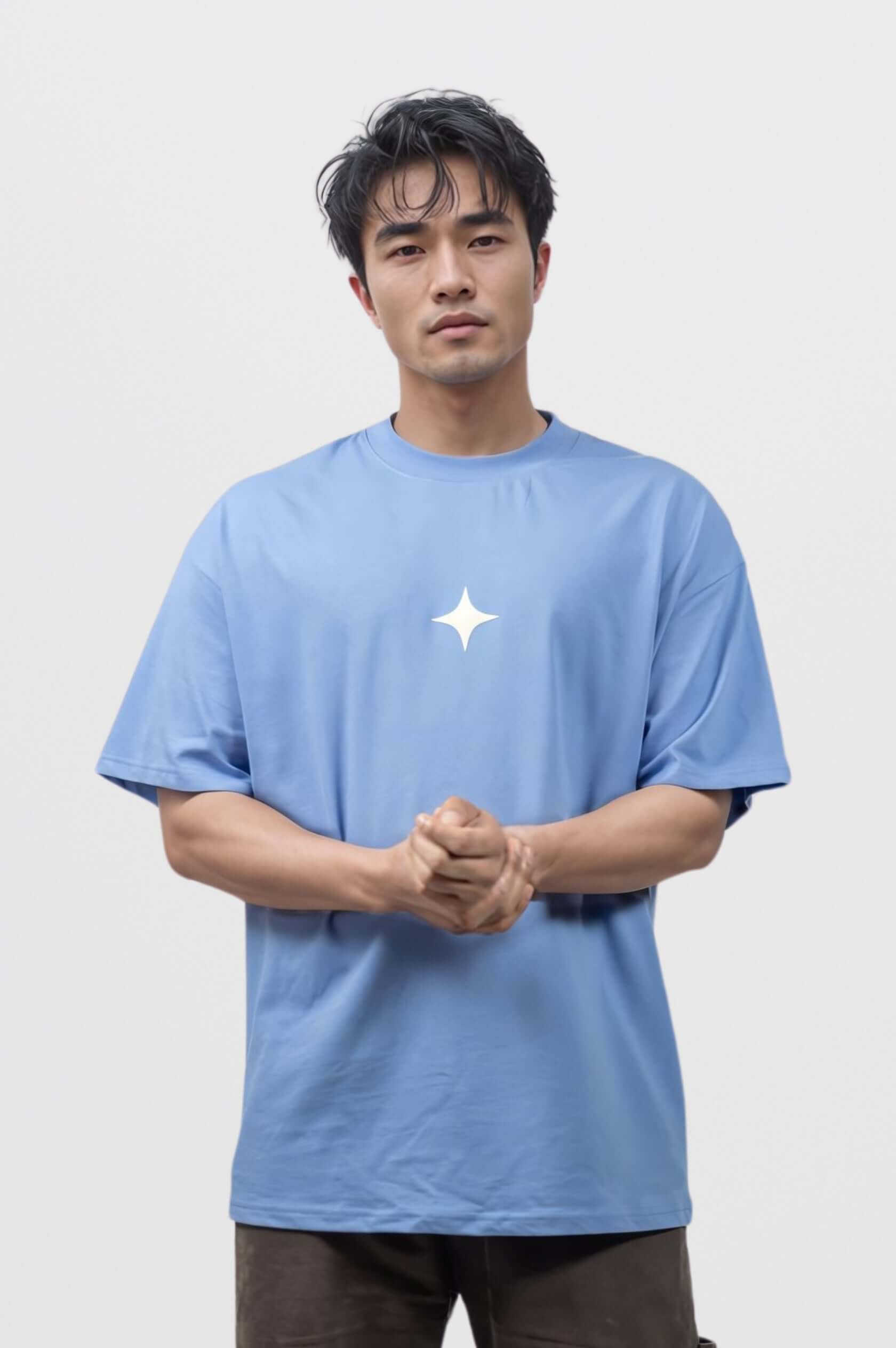 Sky blue oversized tee with white star print, featuring relaxed fit and signature Sanity embroidery.