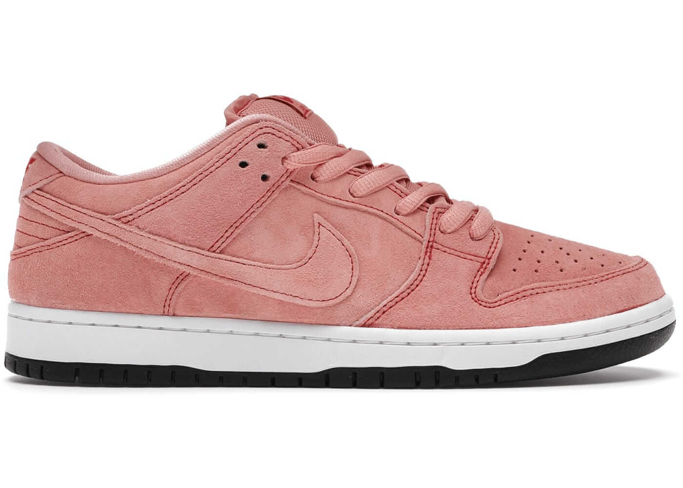 Nike SB Dunk Low Pink Pig sneaker in soft pink suede, featuring white midsole and black outsole, 100% authentic and brand new.