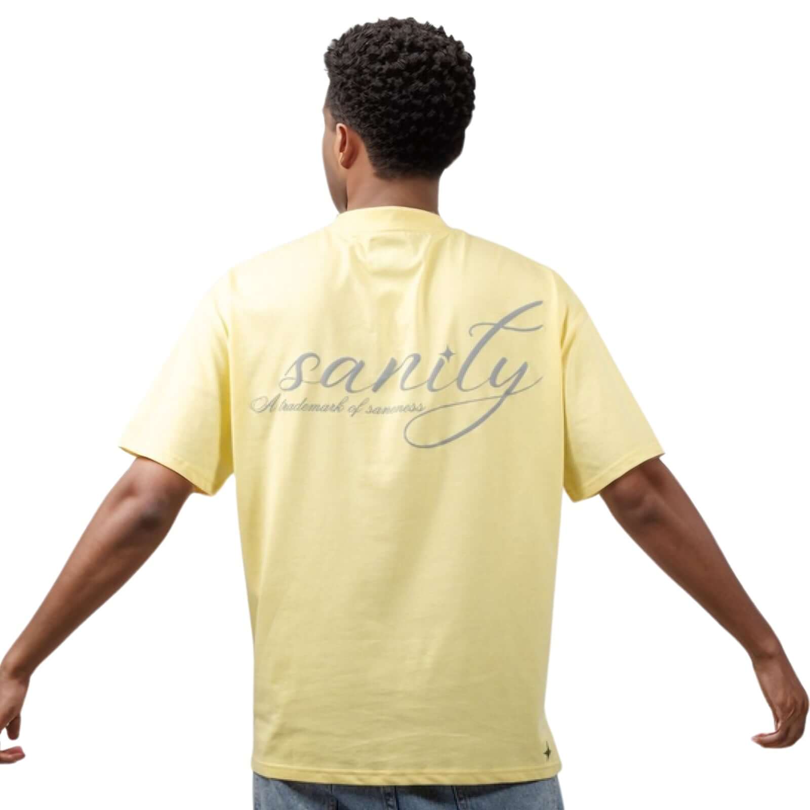 Back view of a yellow tee with chic grey 'sanity' print and comfortable oversized fit, perfect for any wardrobe.