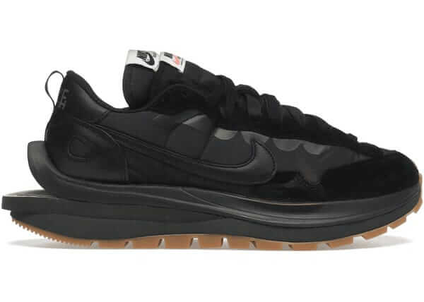 Nike Vaporwaffle Sacai in black with gum sole, showcasing a stylish layered design and premium materials.