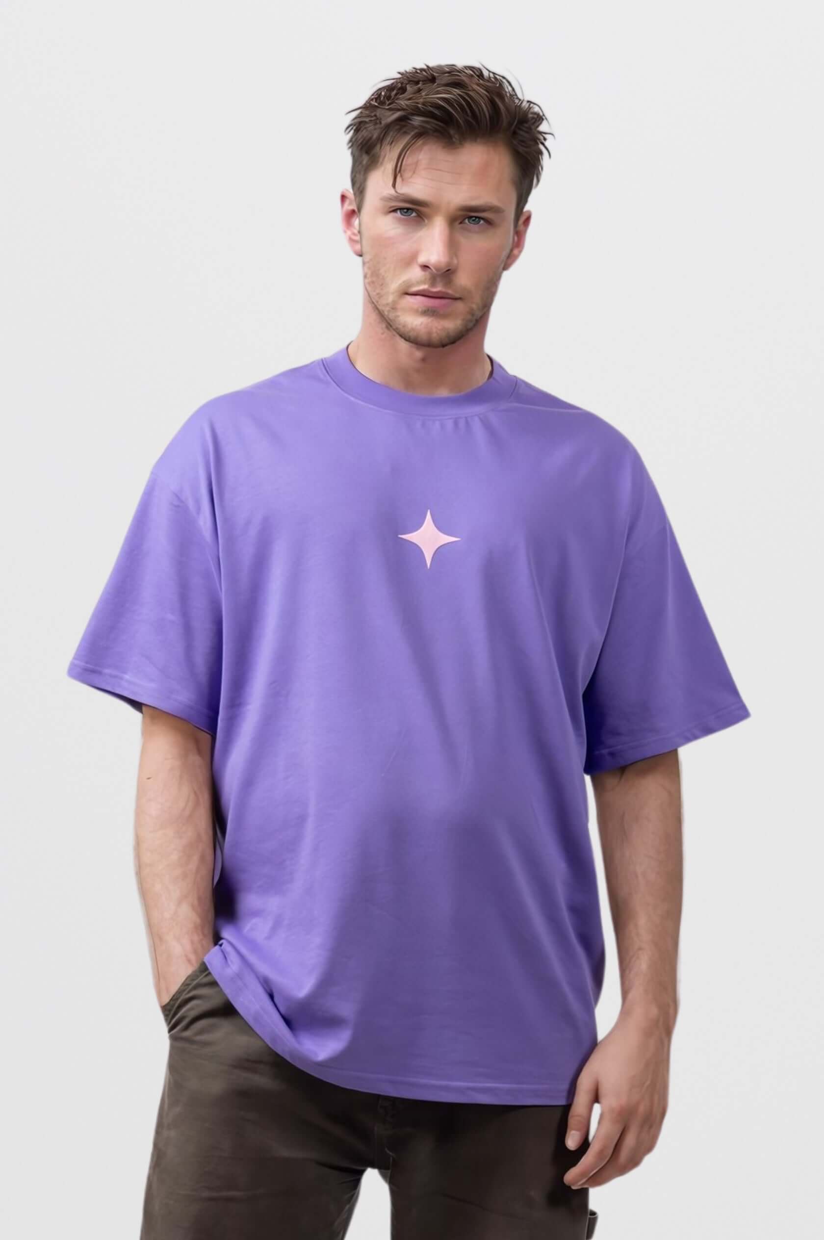 Model wearing a purple oversized tee featuring a light pink star print, perfect for casual comfort and stylish flair.