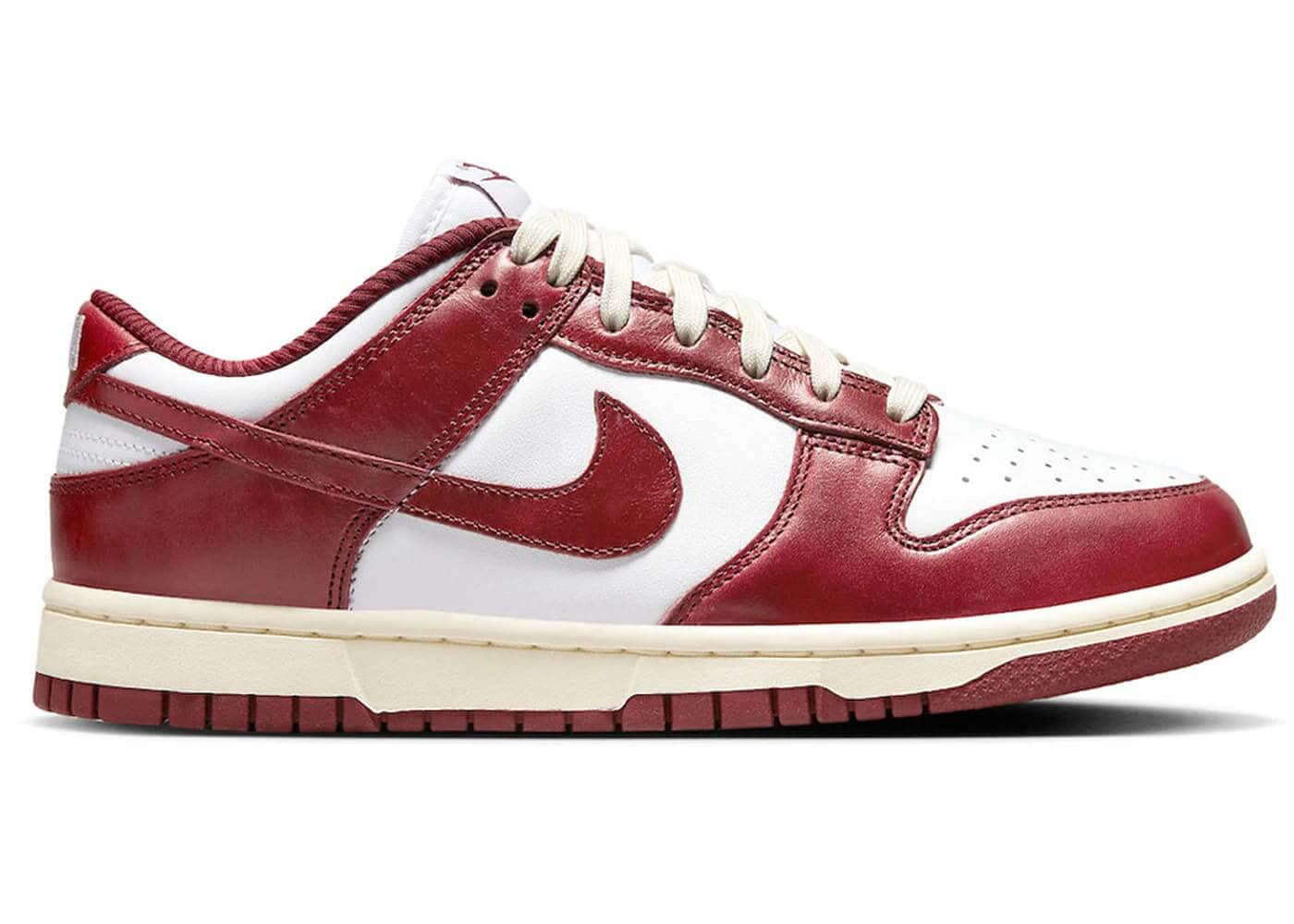 Nike Dunk Low PRM Vintage Team Red women's sneakers featuring red and white colorway, stylish design, and vintage appeal.