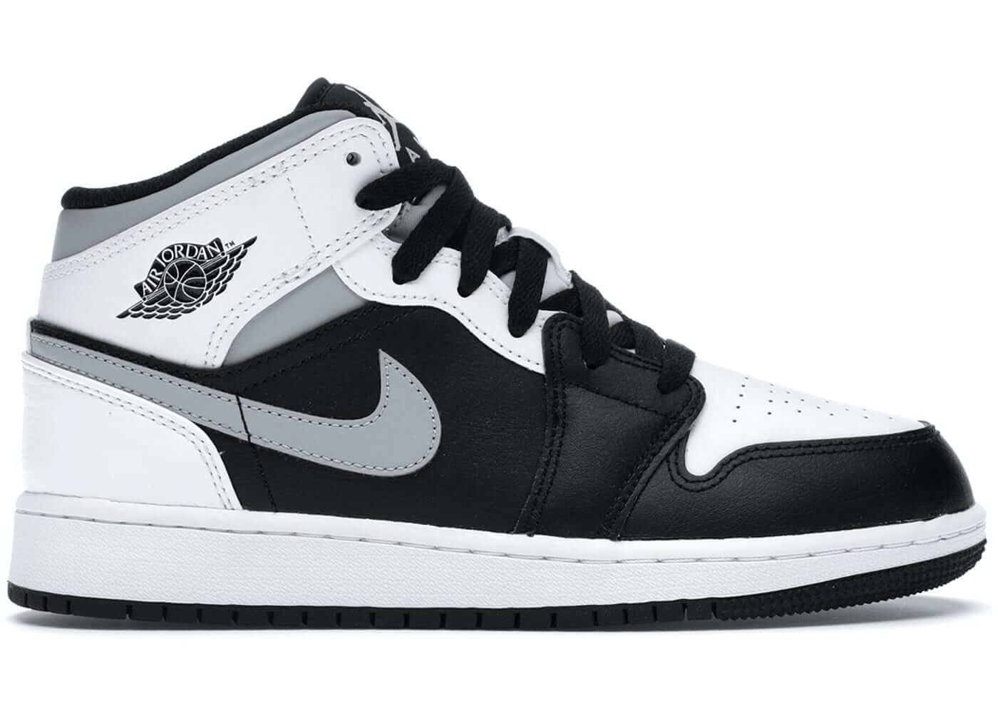 Jordan 1 Mid White Shadow (GS) sneaker in black, white, and grey, showcasing stylish design and brand authenticity.