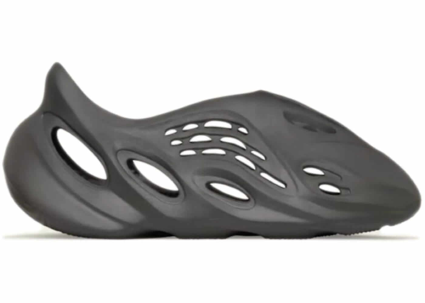 adidas Yeezy Foam RNR Carbon in black, featuring unique design and ventilation holes, 100% authentic with express shipping.