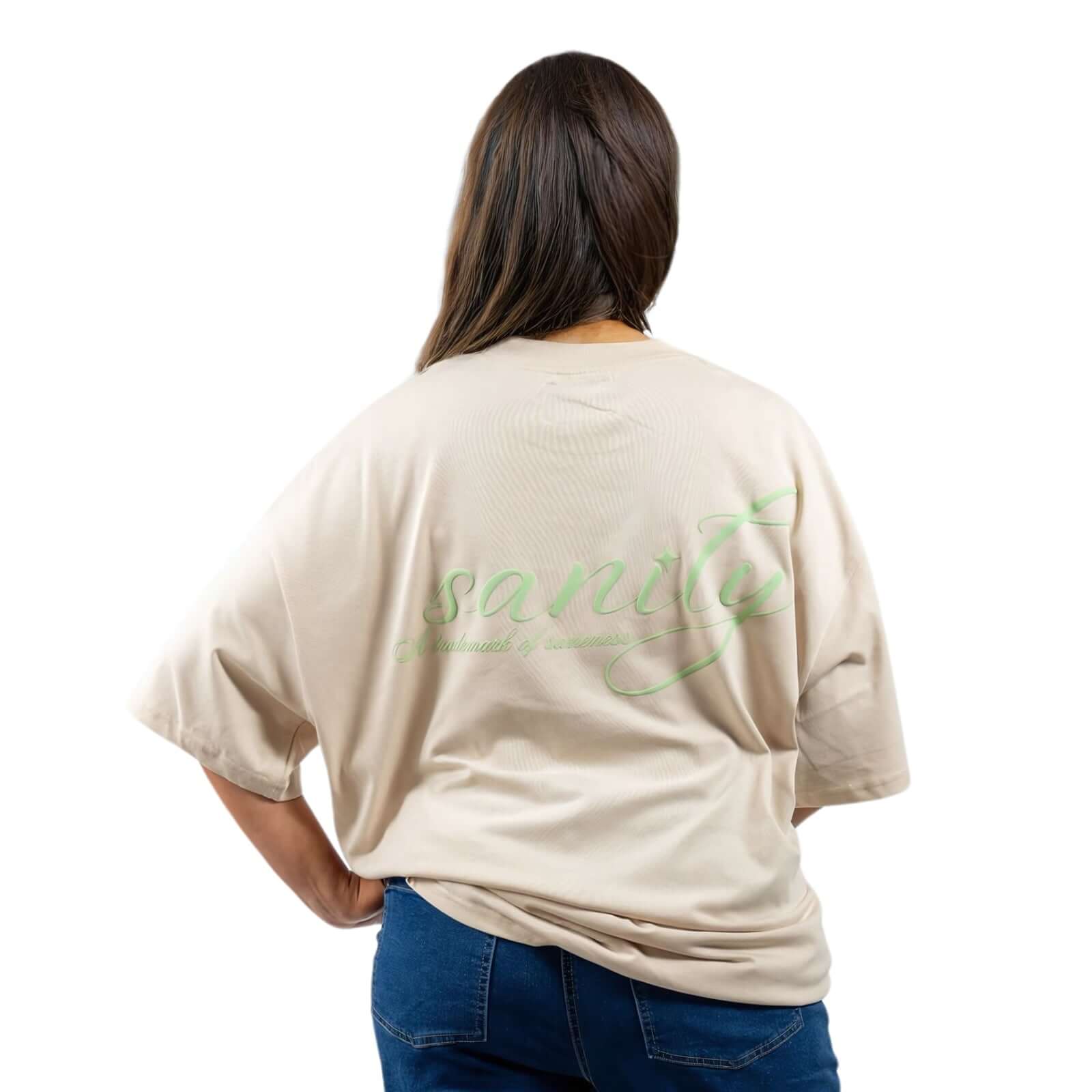 Back view of off-white Sanity mint tee showcasing signature embroidery for a relaxed fit and soft feel.