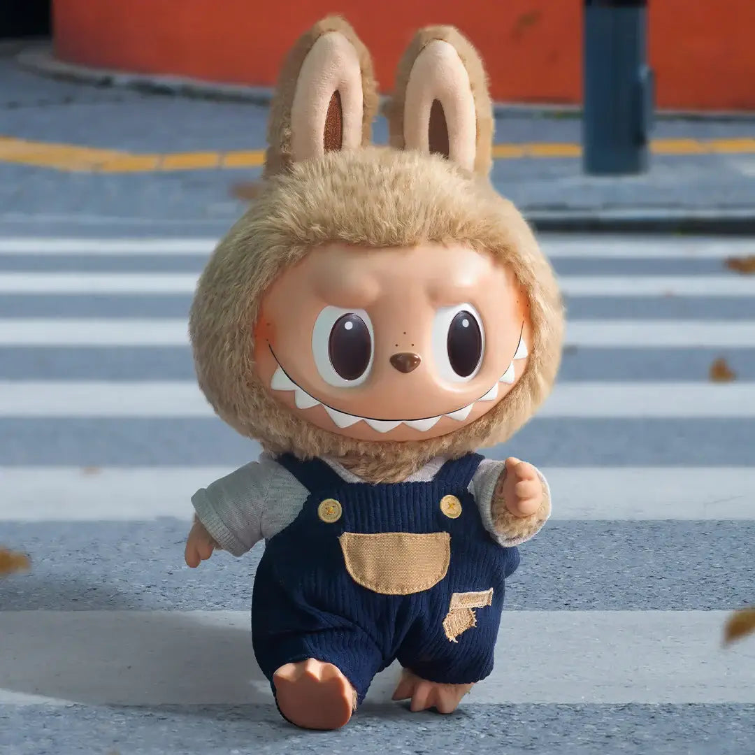 Pop Mart Labubu Time to Chill Vinyl Plush Doll with bunny ears, playful expression, and denim overalls walking on the street.