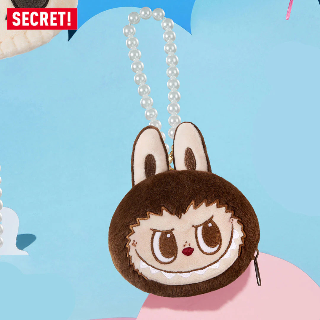 Adorable brown plush coin purse with bunny ears and pearl chain, featuring a playful character design.