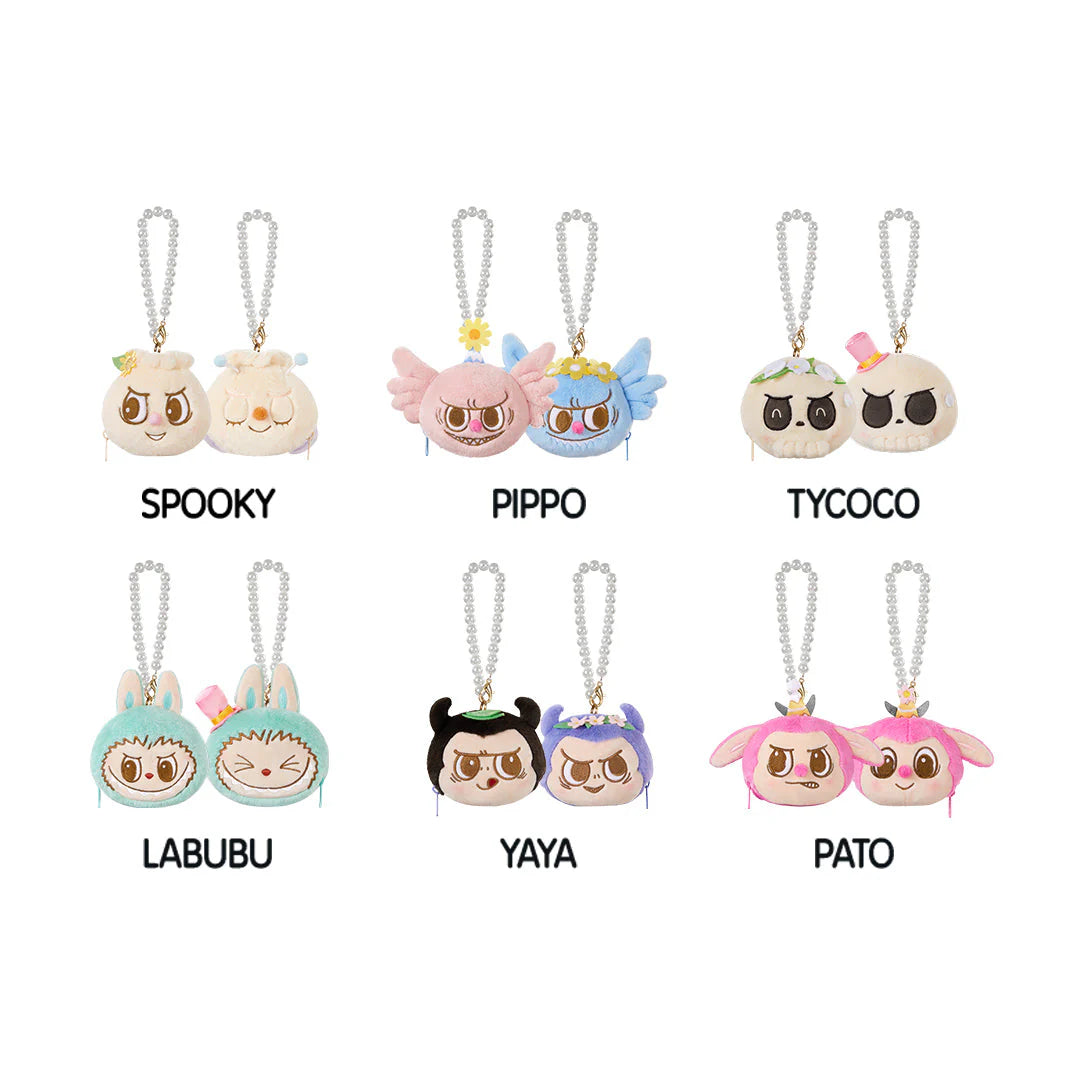 Collection of cute plush keychains featuring characters Spooky, Pippo, Tycoco, Labubu, Yaya, and Pato.