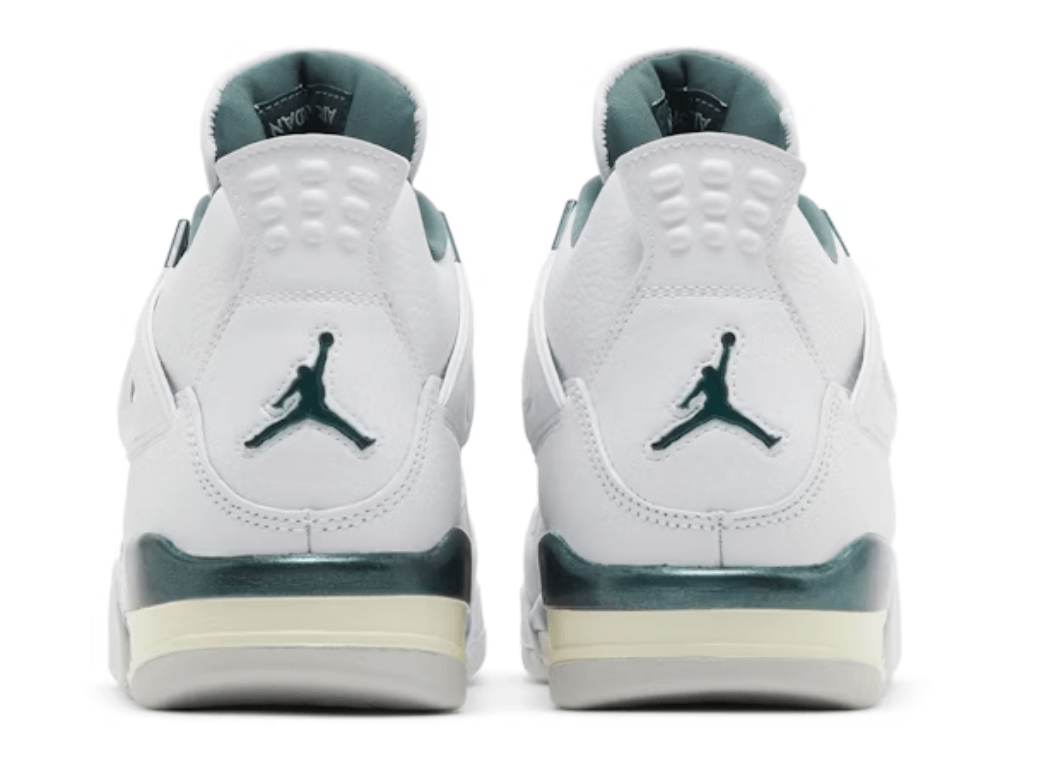 Jordan 4 Retro Oxidized Green (GS) sneakers, featuring a white upper and oxidized green accents, authentic with next day shipping.