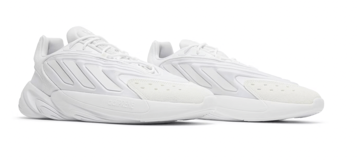 adidas Ozelia White Reflective sneakers in all-white, showcasing a modern design and sleek silhouette.