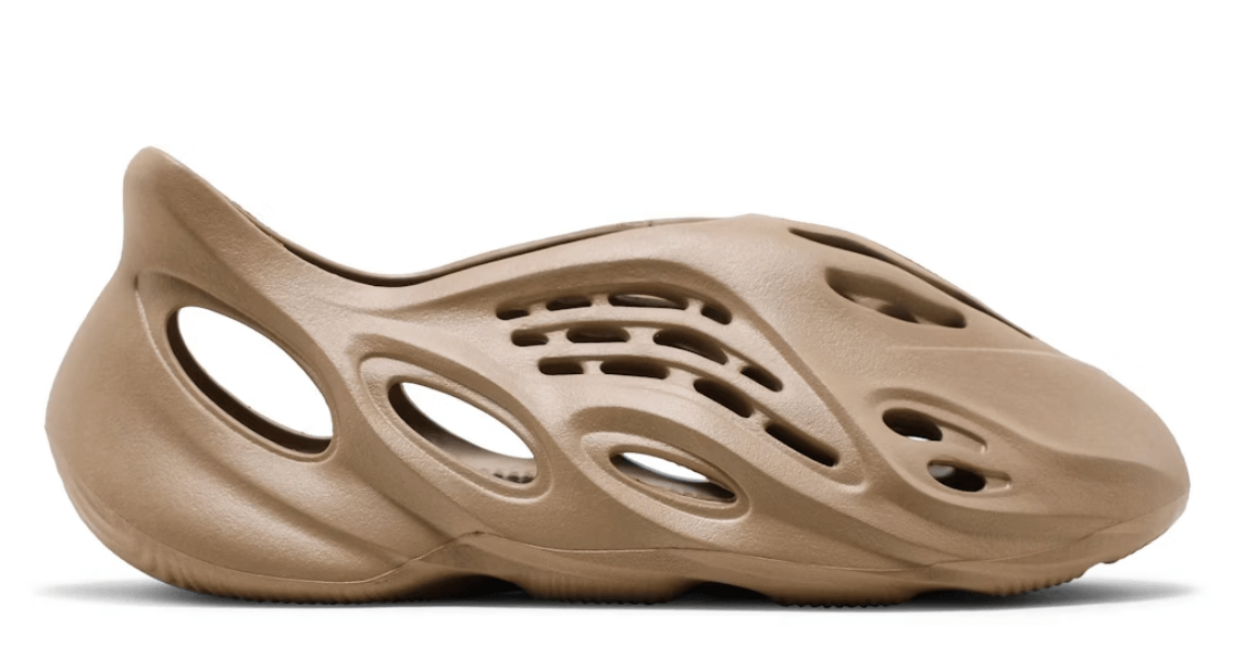 adidas Yeezy Foam RNNR in Ochre, showing unique design and ventilation holes, perfect for casual wear and style.