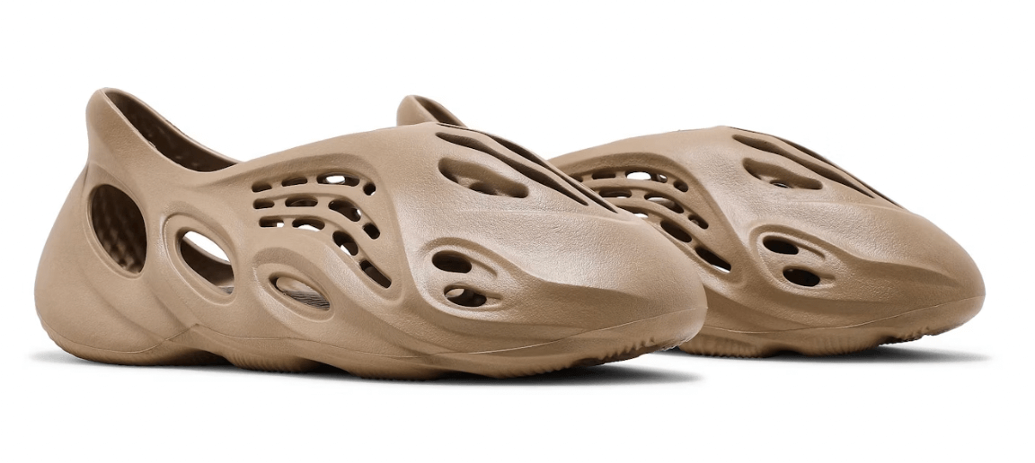 adidas Yeezy Foam RNNR in Ochre color, featuring a modern design with cutouts, 100% authentic and available in various sizes.