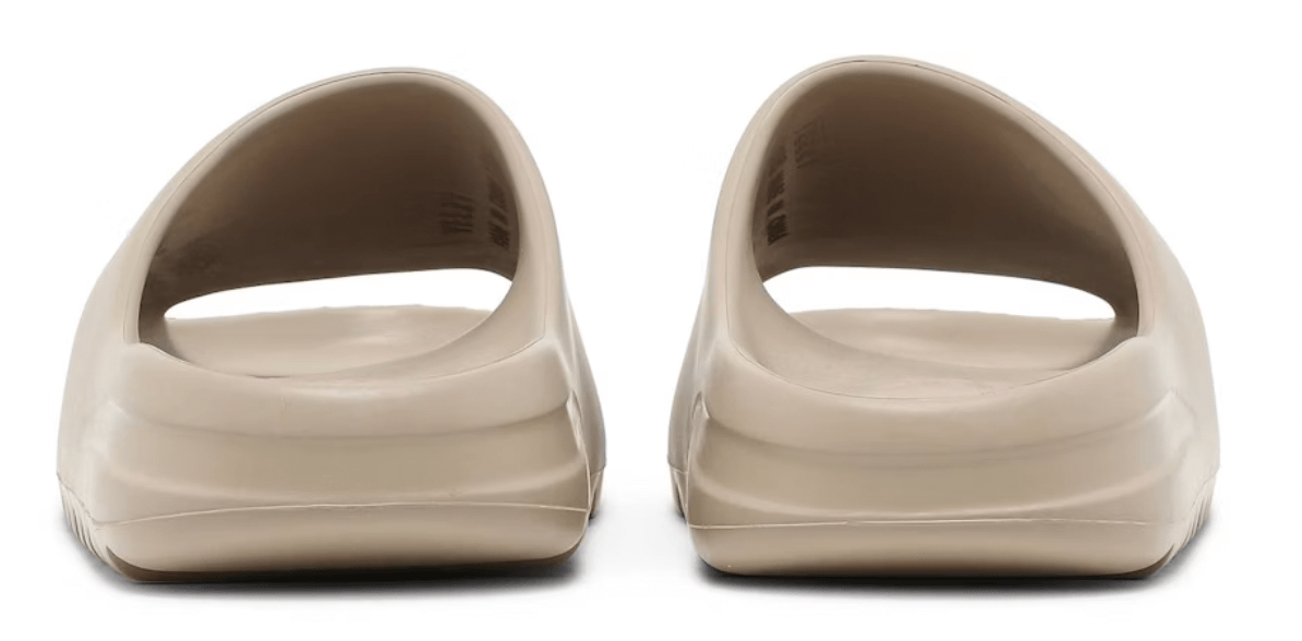 Adidas Yeezy Slide Pure restock pair, featuring a sleek design and comfortable fit, perfect for casual wear.