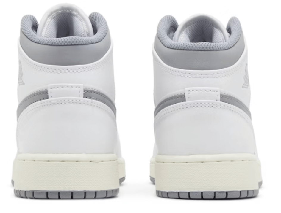 Air Jordan 1 Mid Neutral Grey (GS) back view, featuring white leather and grey accents. 100% authentic sneakers.