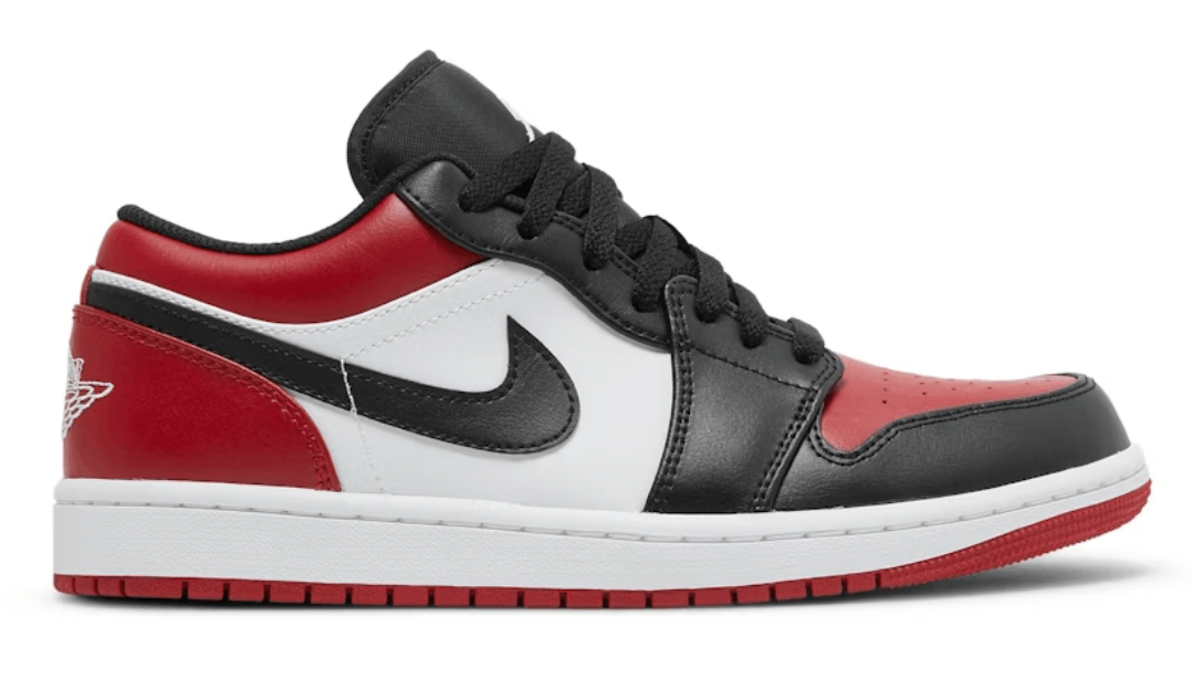 Jordan 1 Low 'Bred Toe' GS sneakers in black, red, and white with next day express shipping, 100% authentic.