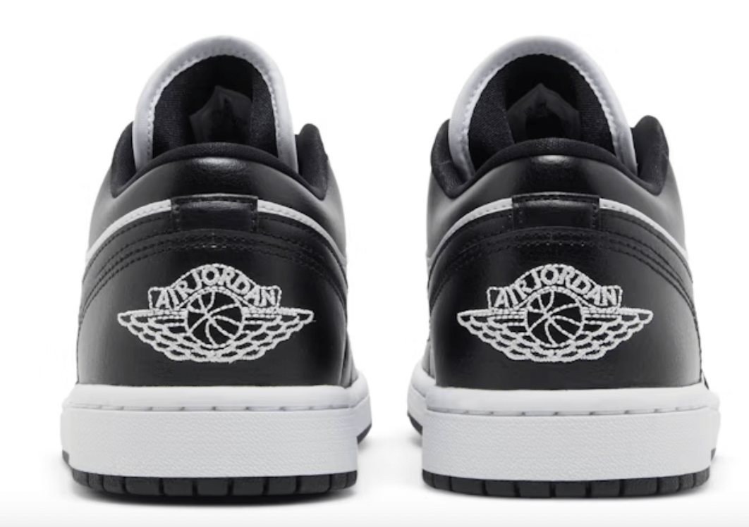 Back view of women's Jordan 1 Low Panda sneakers showcasing the iconic Air Jordan logo in black and white.