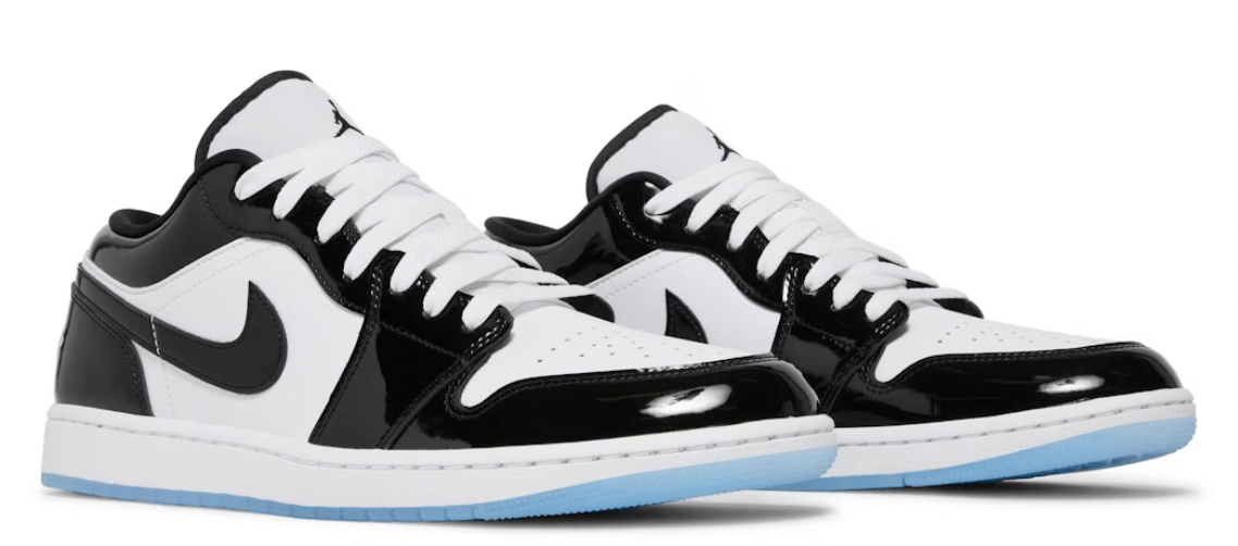 Jordan 1 Low SE Concord (GS) sneakers in black and white with patent leather finish, featuring classic Air Jordan design.