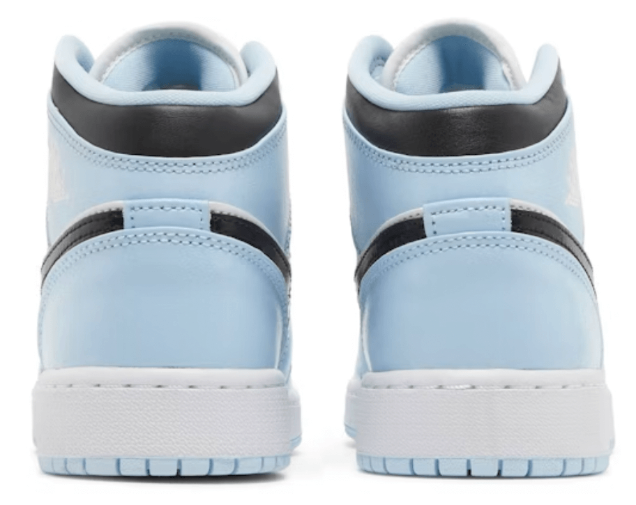 Back view of Jordan 1 Mid Ice Blue (GS) sneakers highlighting the light blue and black colorway.