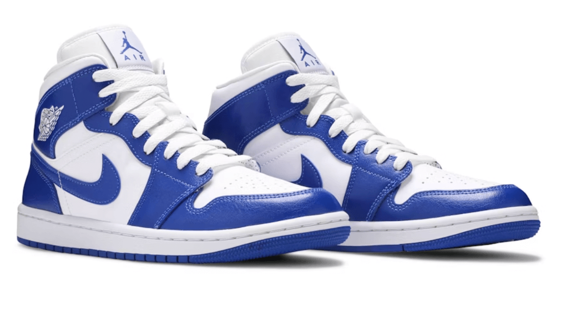 Jordan 1 Mid Kentucky Blue sneakers for women, featuring a blue and white colorway and classic Air Jordan design.