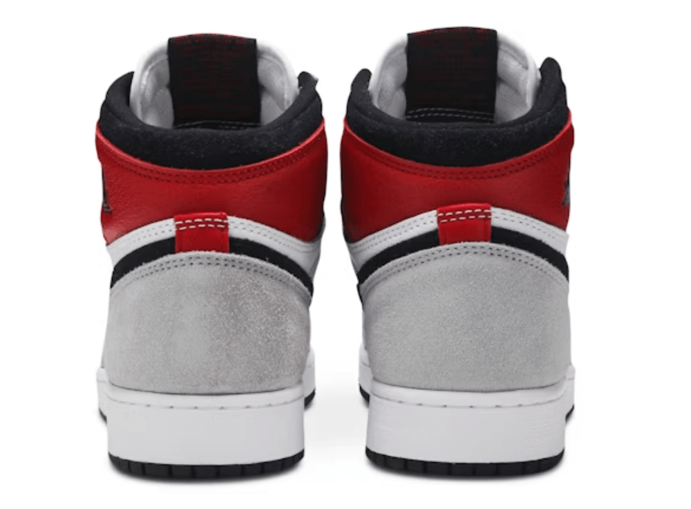 Back view of Jordan 1 Retro High Light Smoke Grey (GS) sneakers showing grey, red, and black design features.