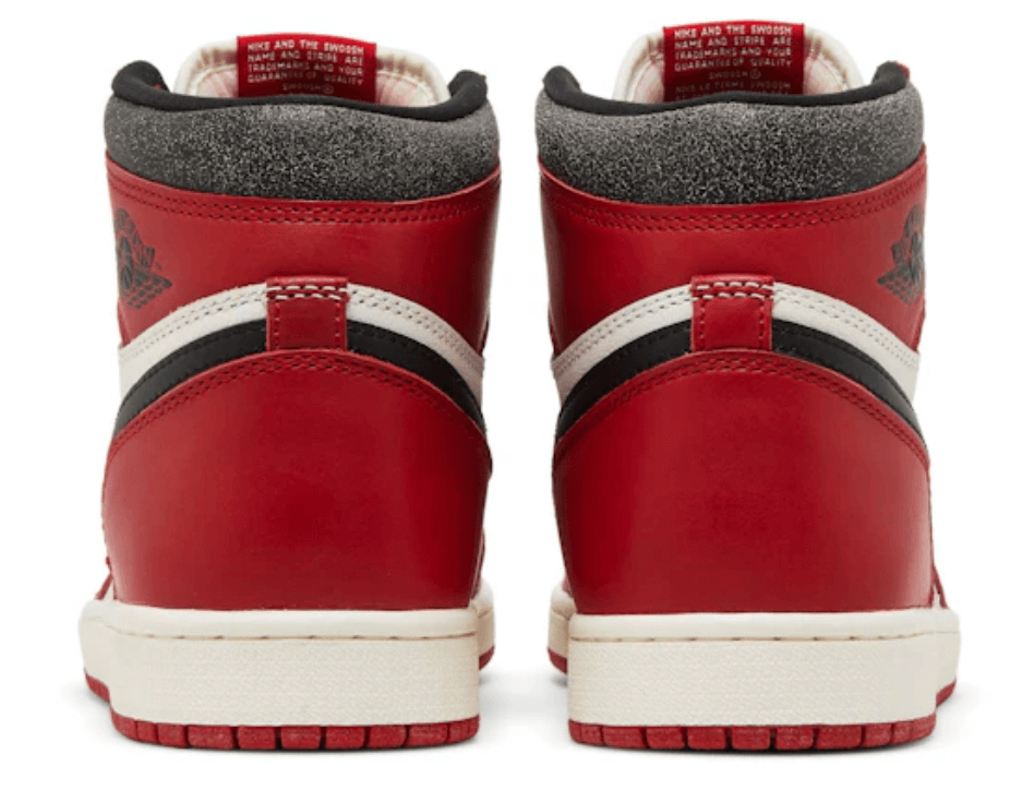 Back view of Jordan 1 Retro High OG Chicago Lost and Found sneaker, showcasing red leather and black accents.