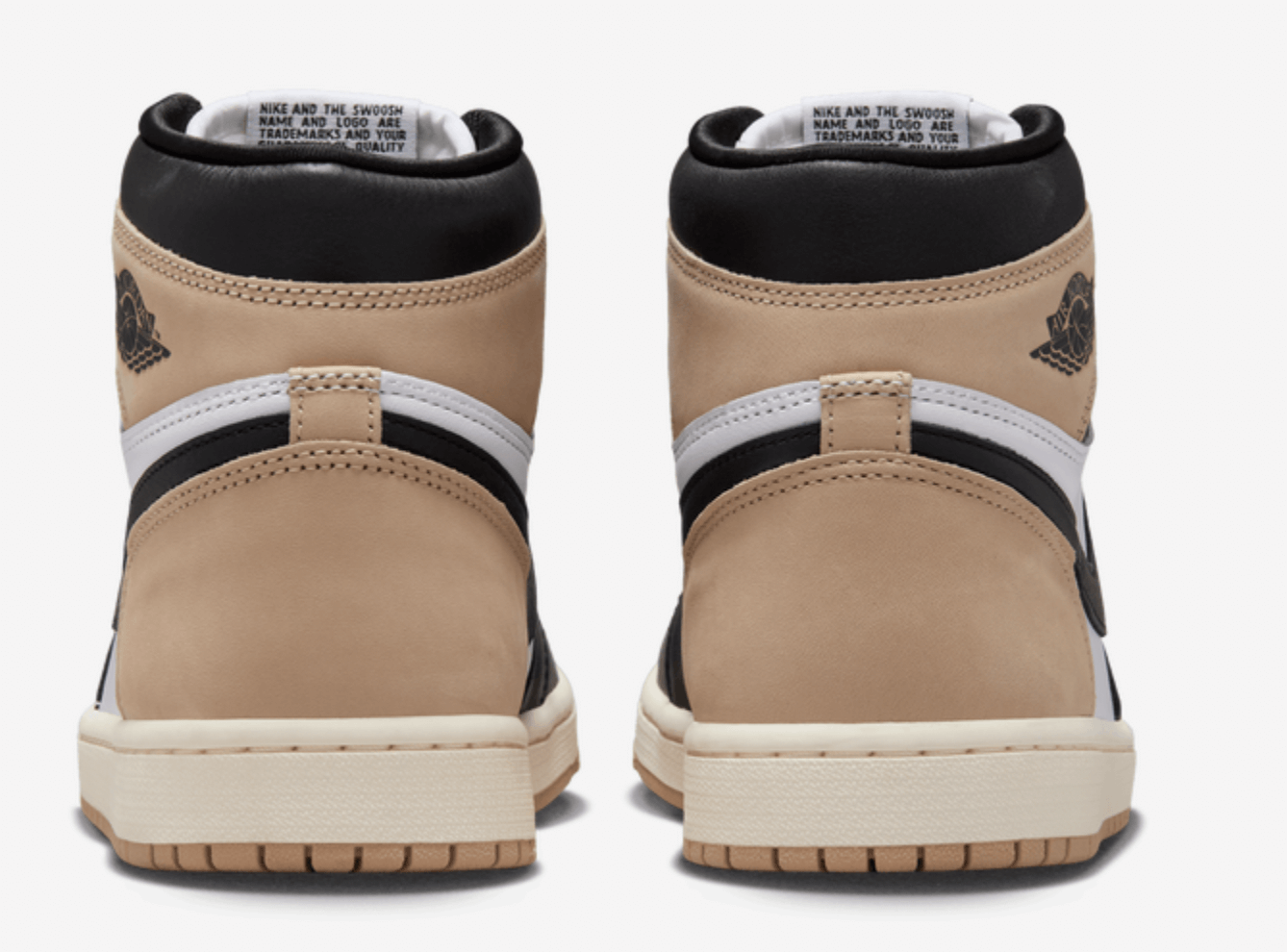 Back view of women's Jordan 1 Retro High OG Latte sneakers featuring beige and black design.