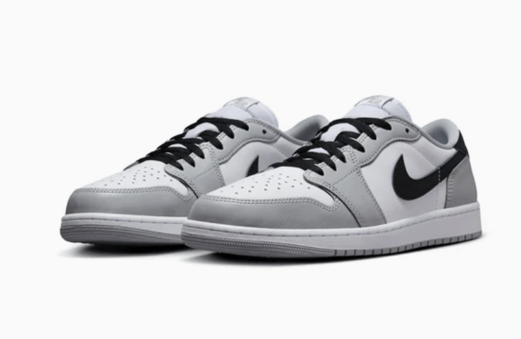 Jordan 1 Retro Low OG Barons sneakers in gray and white with black accents, brand new and 100% authentic.