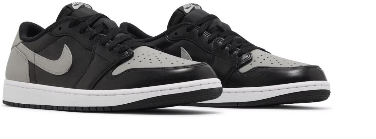 Jordan 1 Retro Low OG Shadow sneakers in black and grey, showcasing a stylish low-cut design and premium materials.