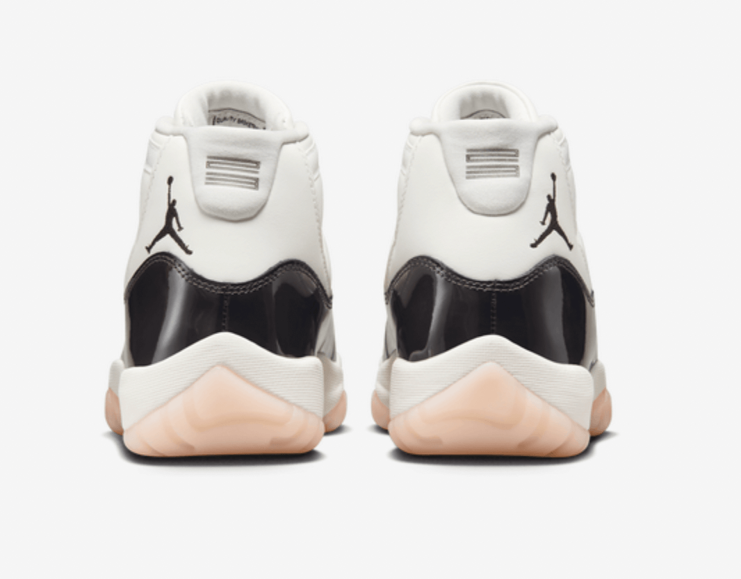 Back view of Jordan 11 Retro Neapolitan women's sneakers in white and black with pink sole. 100% authentic, brand new.