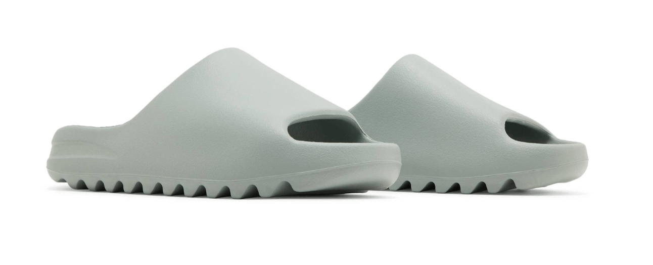 adidas Yeezy Slide Salt in light gray color, featuring a minimalist design and comfortable fit.