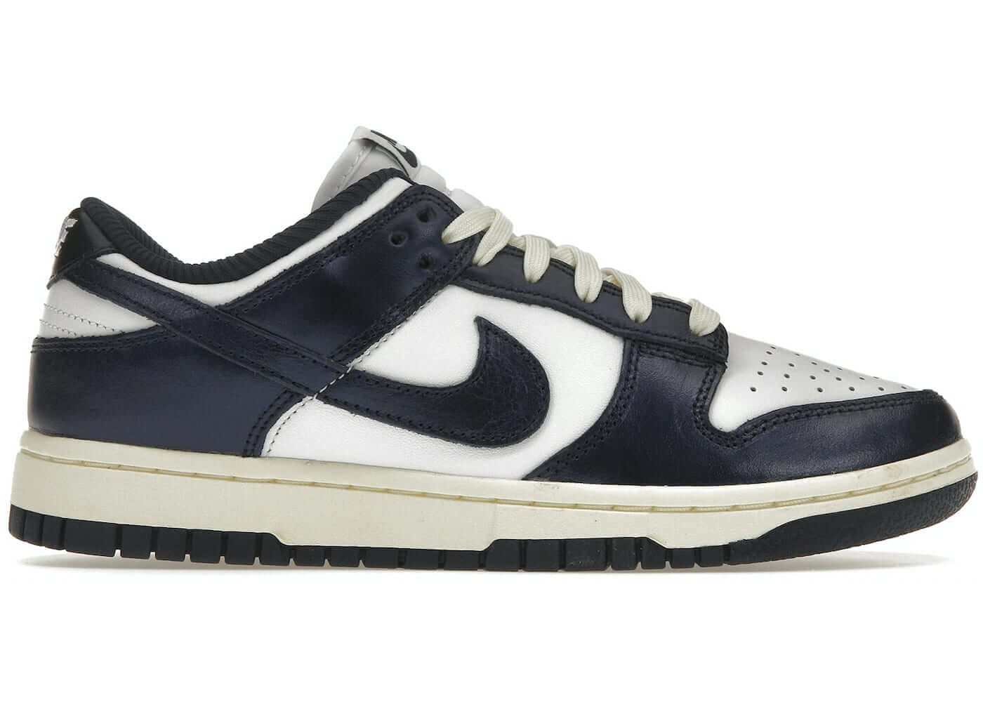 Nike Dunk Low PRM Vintage Navy women's shoes, brand new and authentic, featuring navy and white colorway, stylish design.