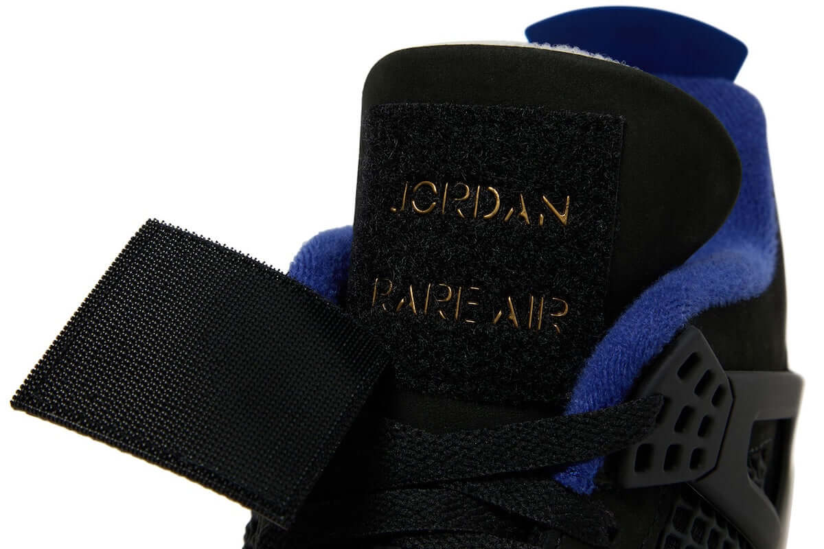 Close-up of Air Jordan 4 Rare Air sneaker showcasing premium materials and iconic branding.