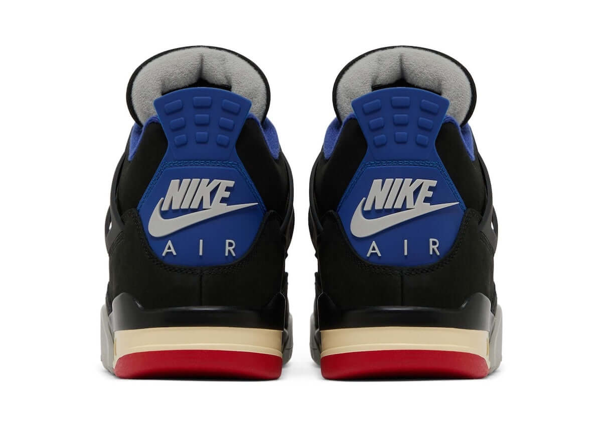 Back view of Air Jordan 4 Retro Rare Air sneakers showcasing black and blue design with Nike branding.