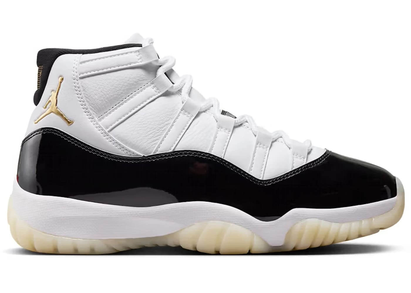 Jordan 11 Retro DMP Gratitude (2023) sneaker in black and white with gold accents side view.