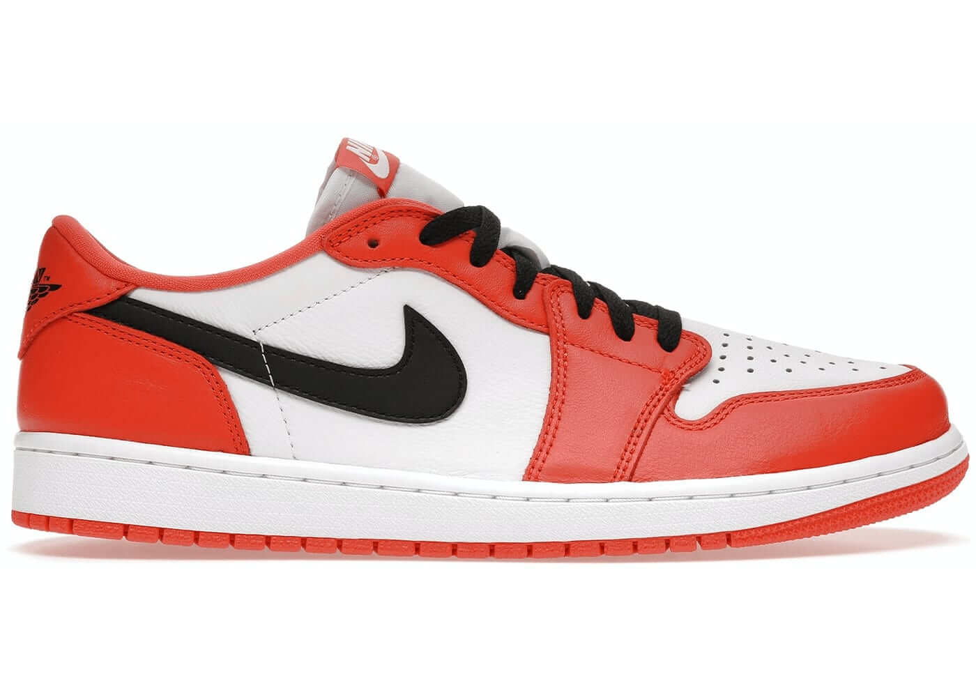 Jordan 1 Low Starfish sneaker in white, orange, and black colorway, featuring classic design and Nike branding.