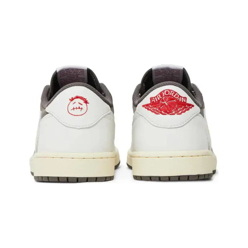 Back view of Air Jordan 1 Retro Low OG SP Travis Scott Reverse Mocha sneakers showcasing white leather and Mocha detailing.