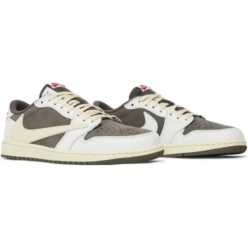 Air Jordan 1 Retro Low OG SP Travis Scott Reverse Mocha sneakers in mocha and off-white colorway with reverse Swoosh.