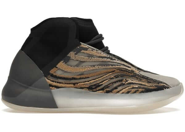 adidas Yeezy QNTM Amber Tint sneaker with marbled amber upper and semi-translucent sole on a white background.