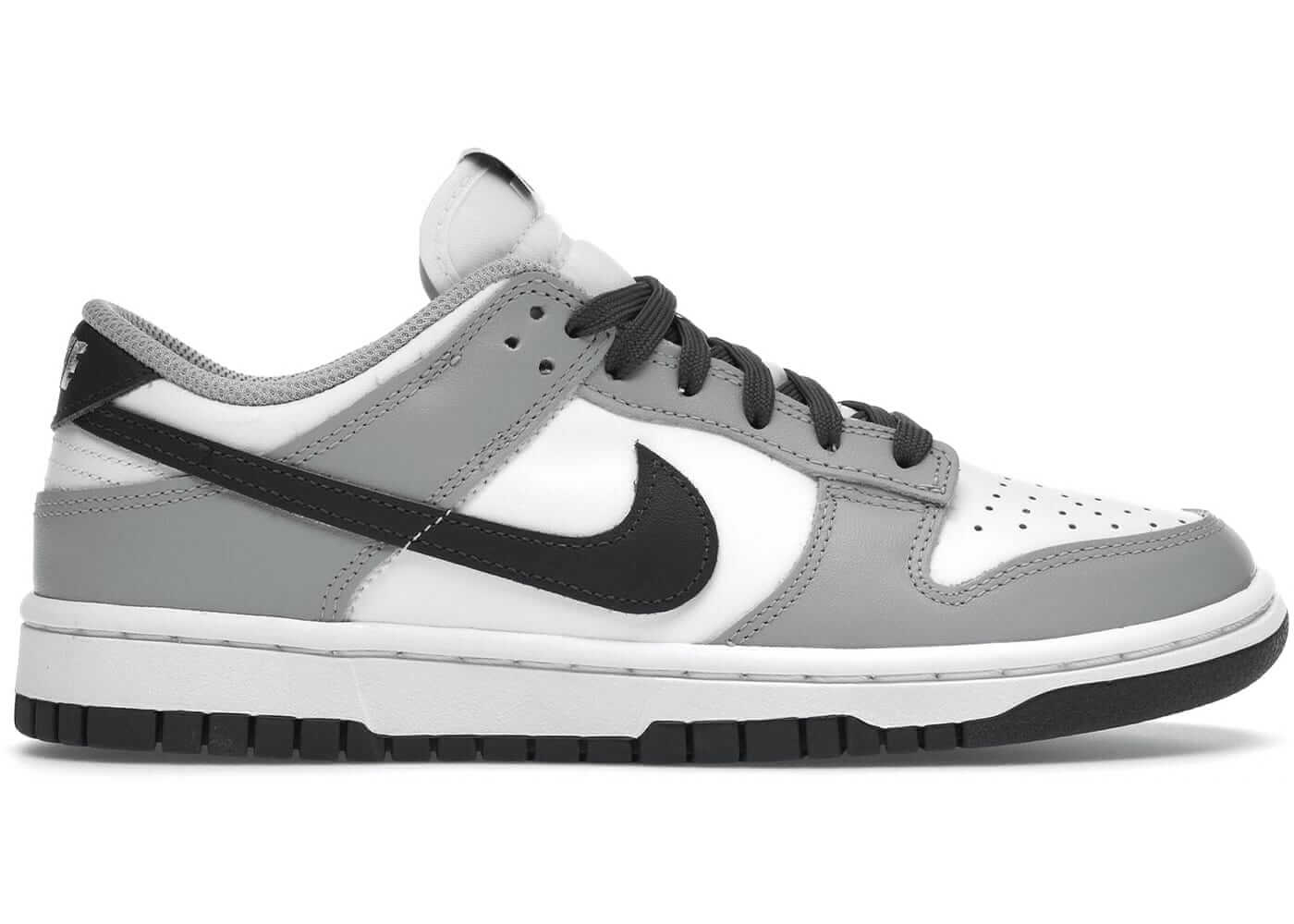 Nike Dunk Low Light Smoke Grey for women, featuring a sleek design with grey, white, and black accents. 100% authentic.